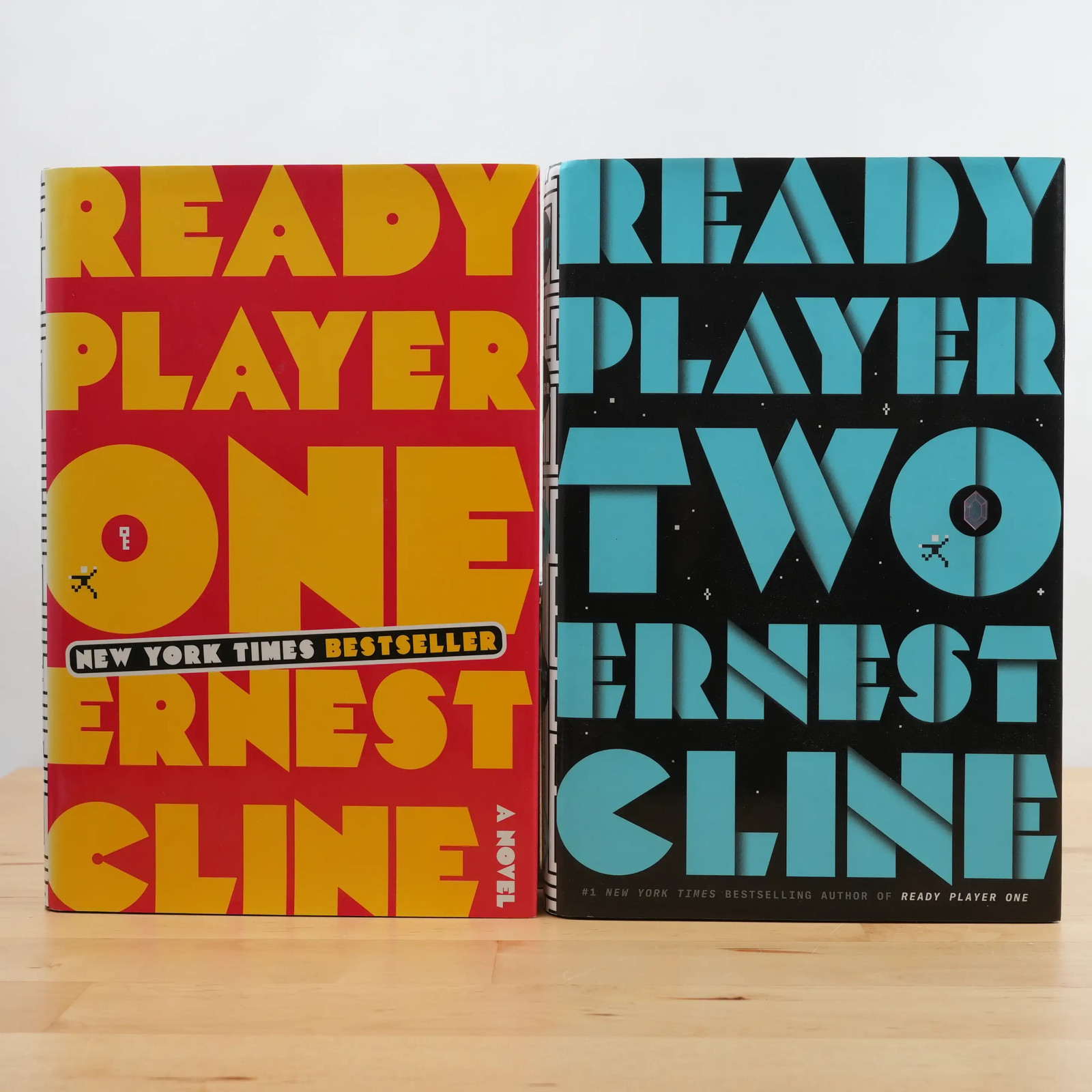 Ready Player One (1st/28th) and Ready Player Two (1st/1st) by Ernest Cline