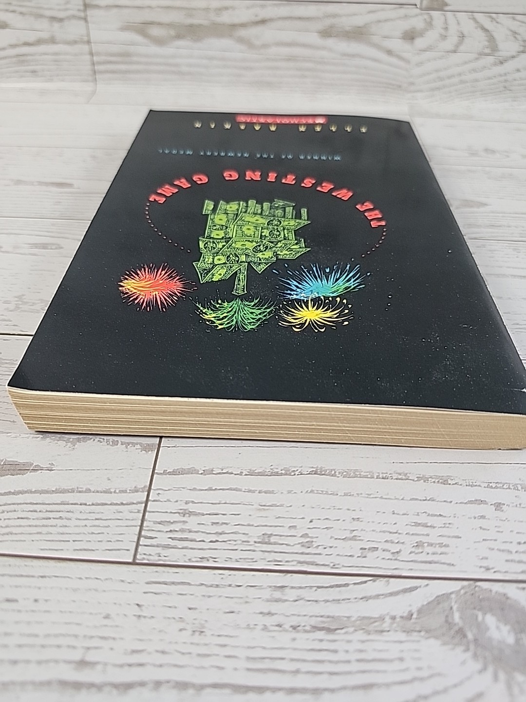 The Westing Game – by Ellen Raskin – Scholastic Paperback Very Good