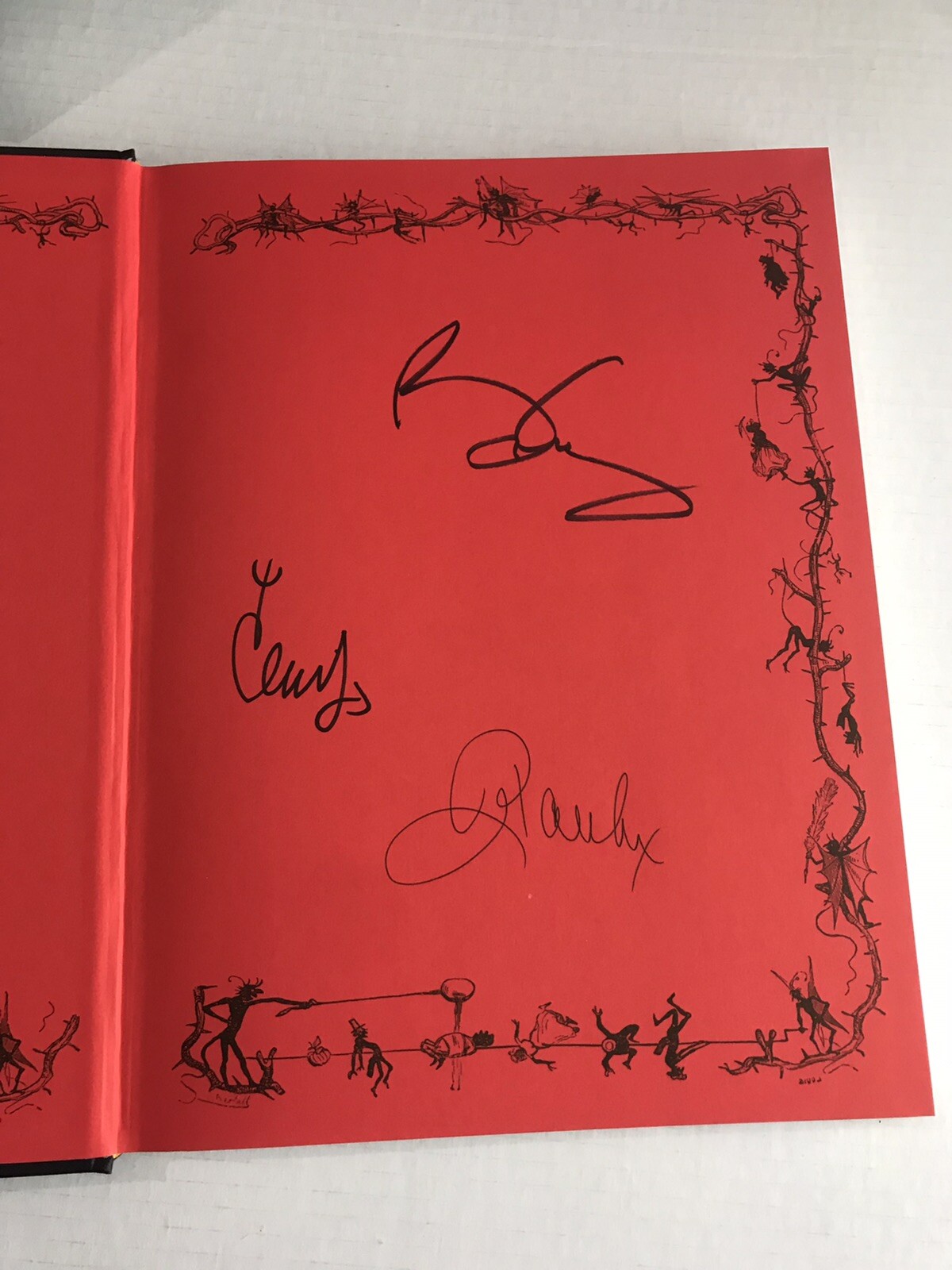 Autographed Brian May Queen guitarist book “Diableries” signed by 3 contributors